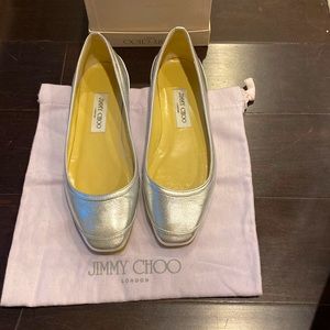 Never worn silver Jimmy Choo ballet slippers